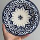 Raised dish, ceramic plate with blue and white patterns.