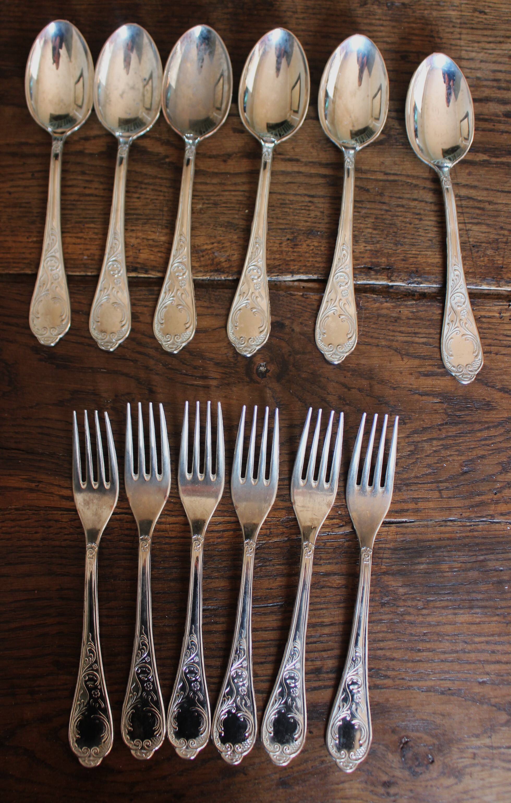 A set of 6 forks + 6 spoons silver metal foliage