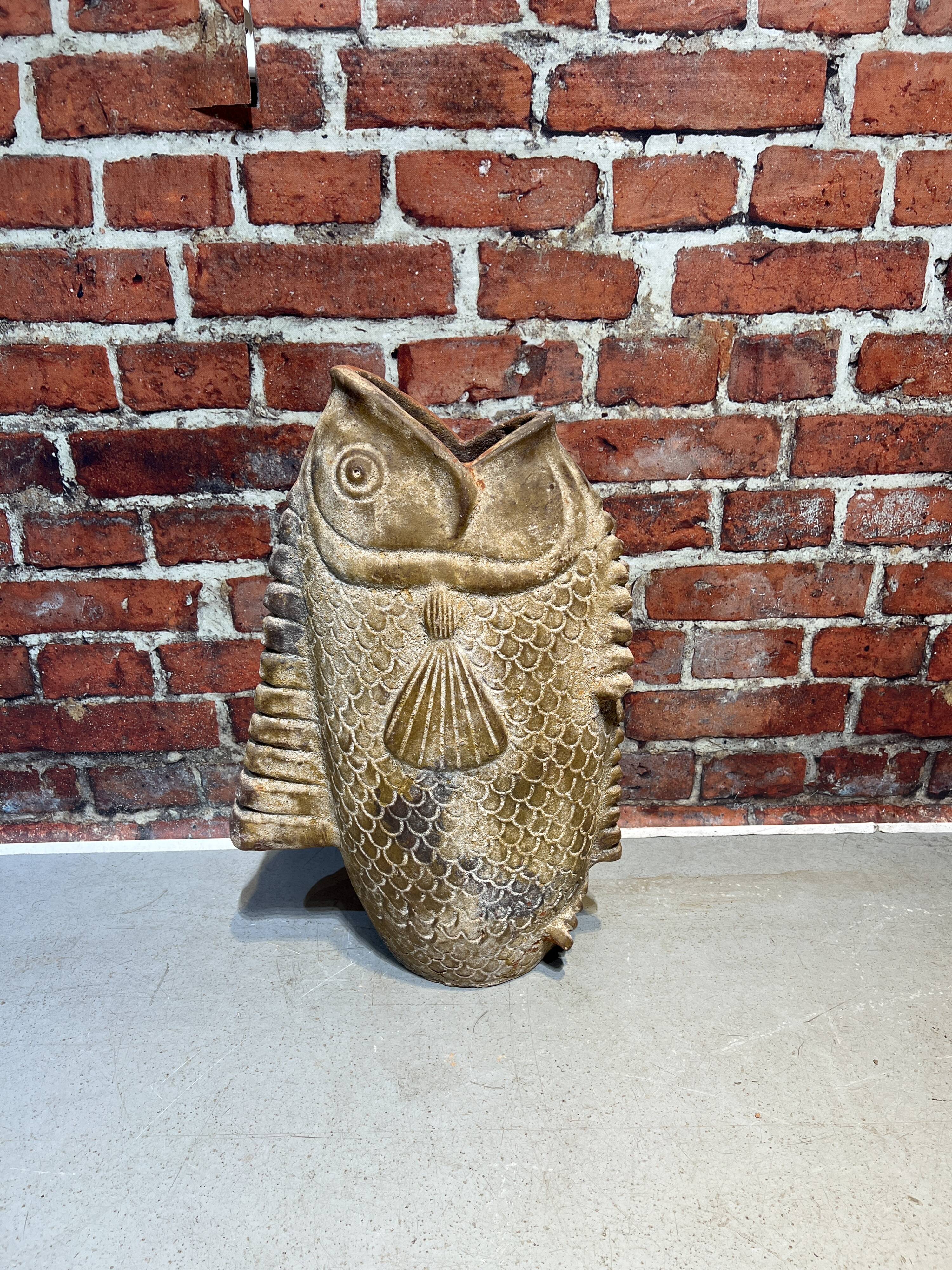 Terracotta umbrella stand in the shape of a fish