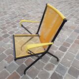 Folding chair in red scoubidou and black metal structure