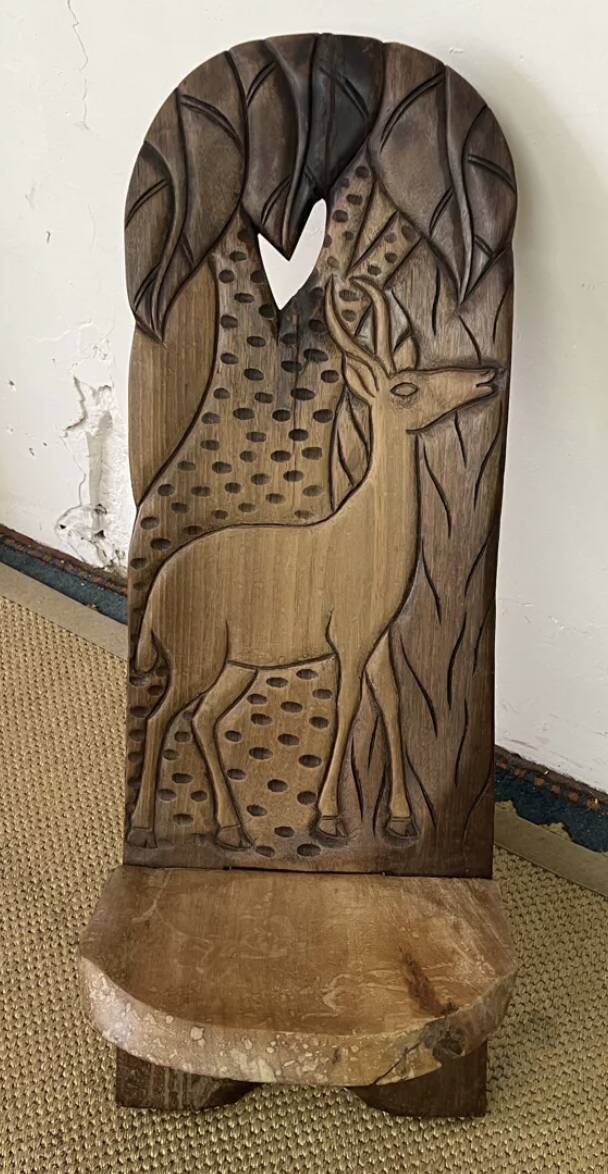 African carved wooden palaver chair