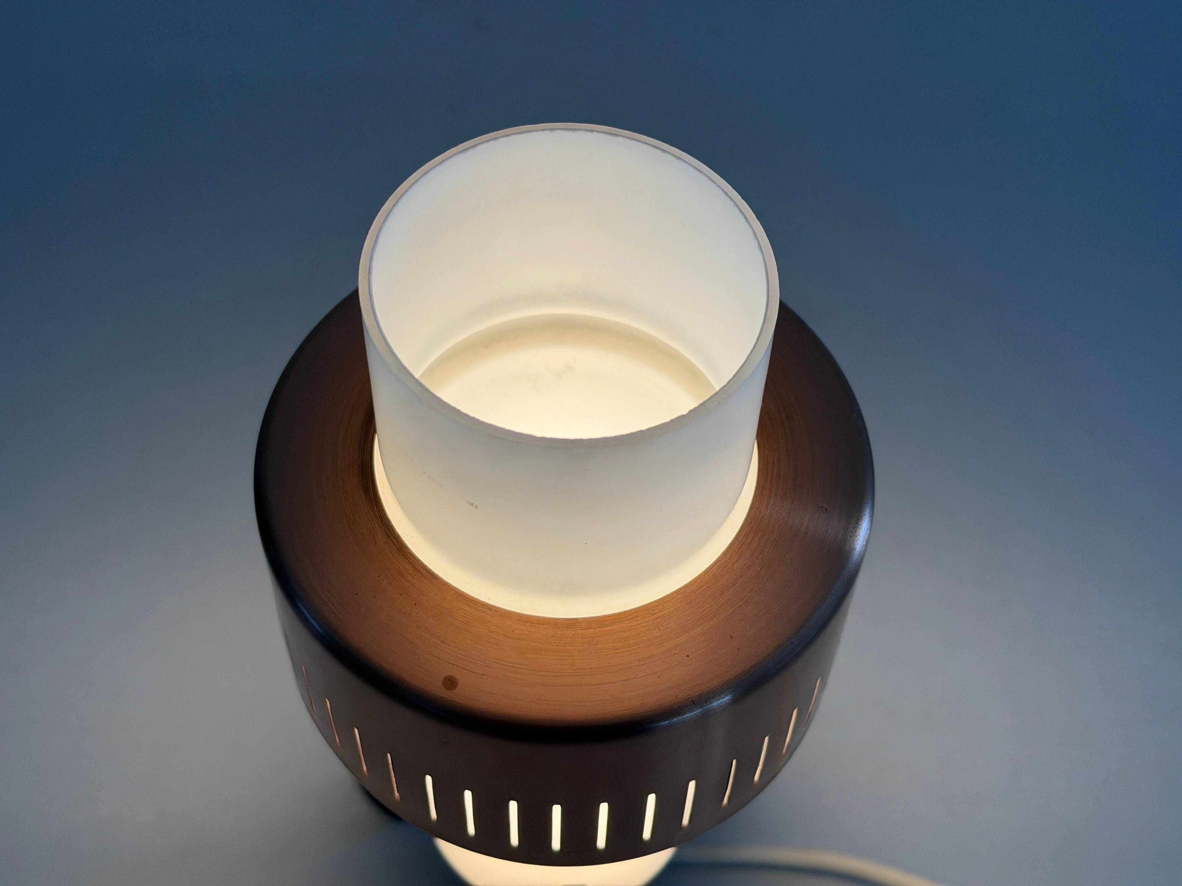 Simple table lamp in copper metal and opal glass, 1960s, Germany