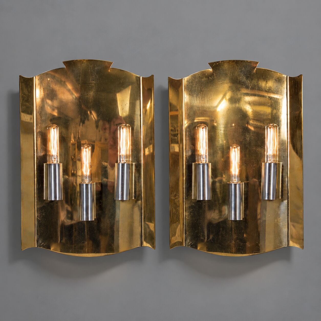 Pair of Scandinavian wall sconces in brass, circa 1930.
