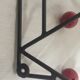 Coat rack red ball