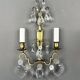 Pair of brass and crystal wall lights, 20th Century