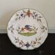 Assiette décorative en faience de Moustiers signée MF
