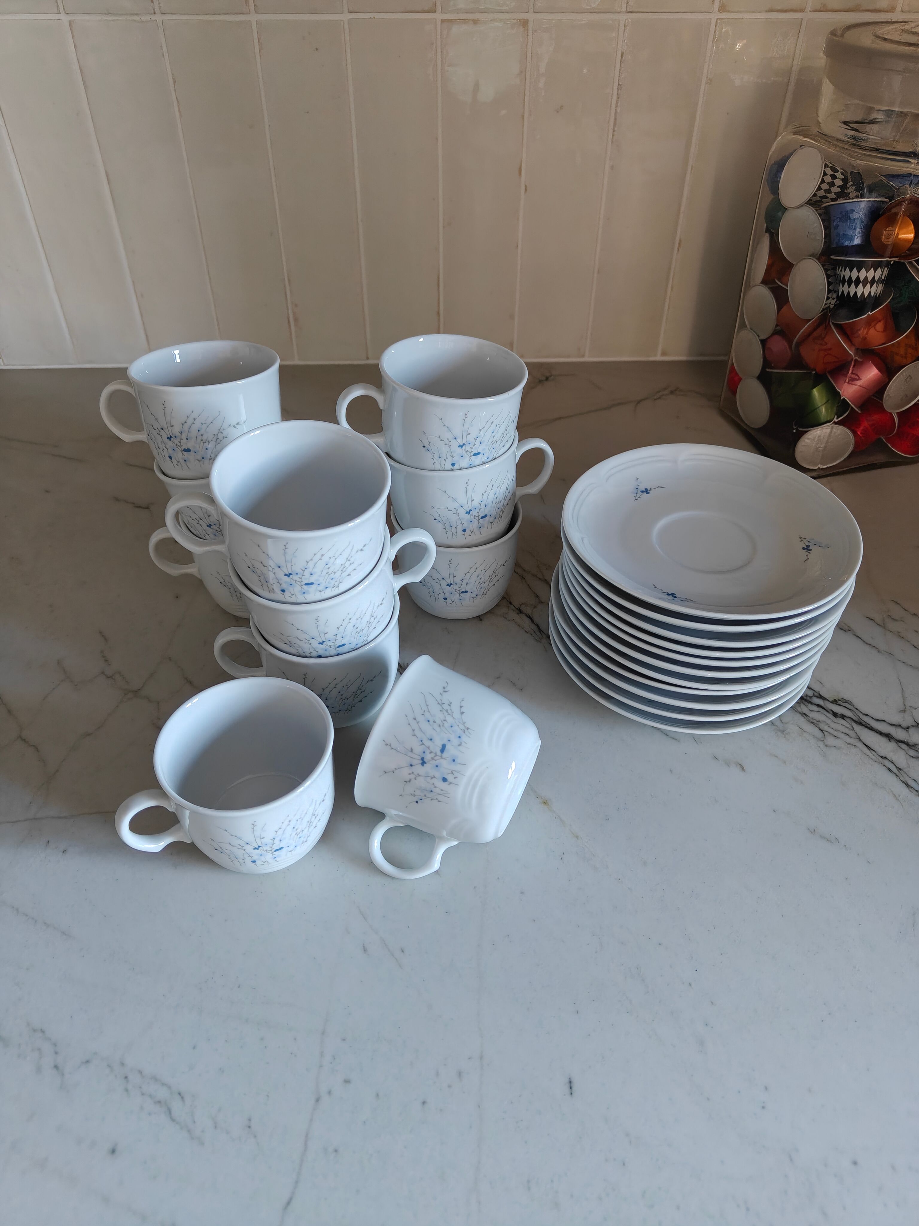 11 cups and saucers