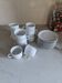 11 cups and saucers