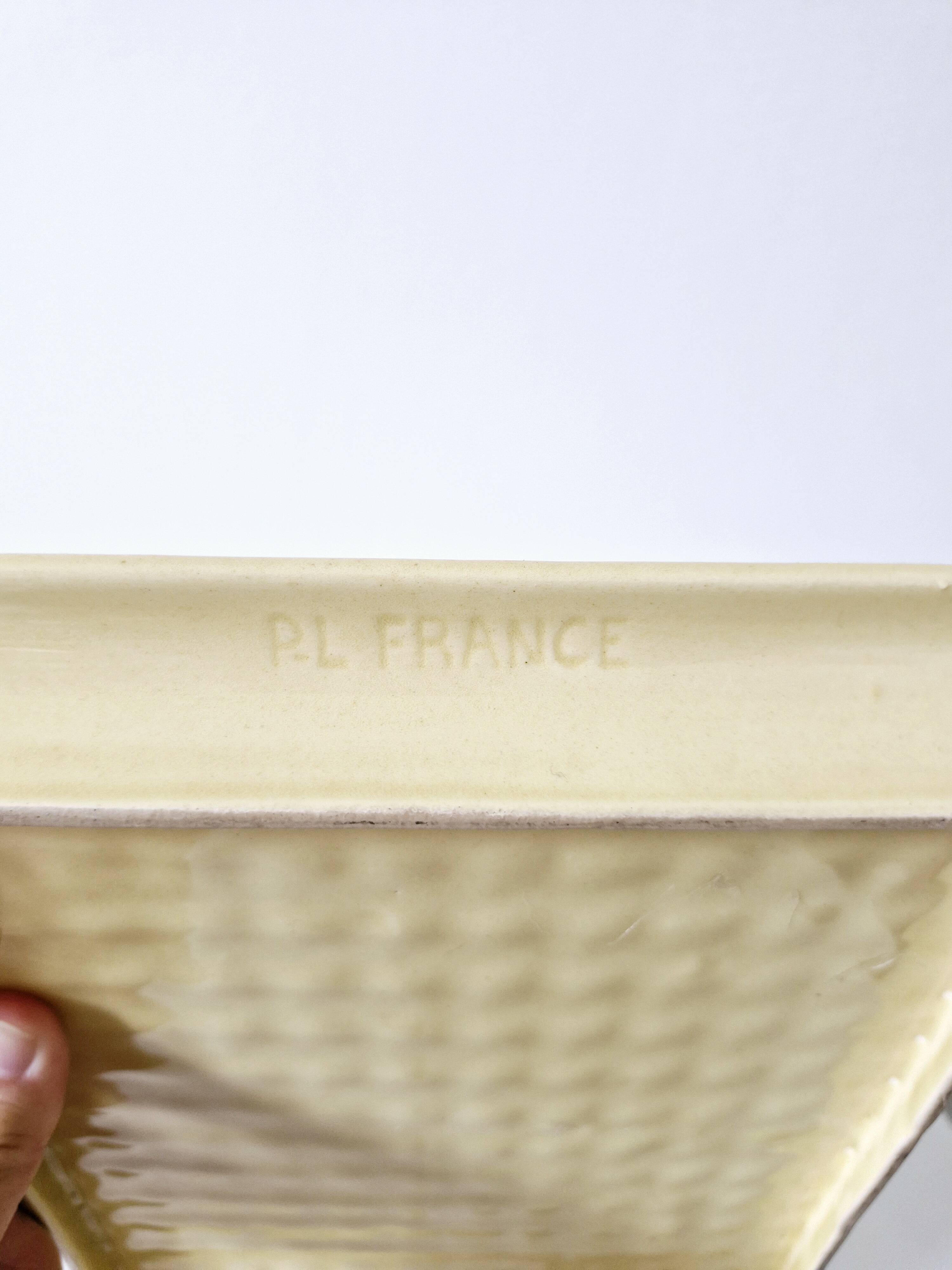 Plateau Poët Laval 1950s yellow straw ceramic with woven patterns.