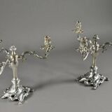 Pair of three-armed silver-plated metal candelabras