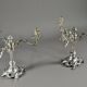 Pair of three-armed silver-plated metal candelabras