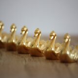 6 Golden swans bear name