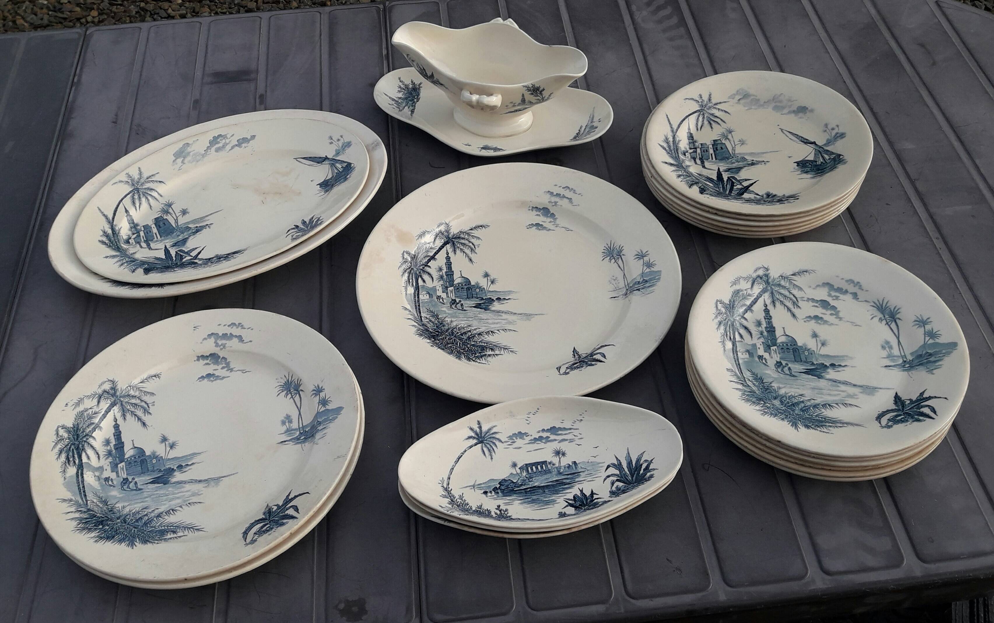 Gien earthenware service, Vues d'Orient model, 21 pieces, late 19th century