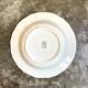 Round and hollow gien dish in white and blue enamelled earthenware