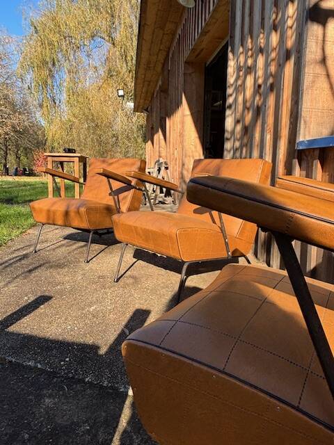 4 camel faux leather armchairs, 1950s
