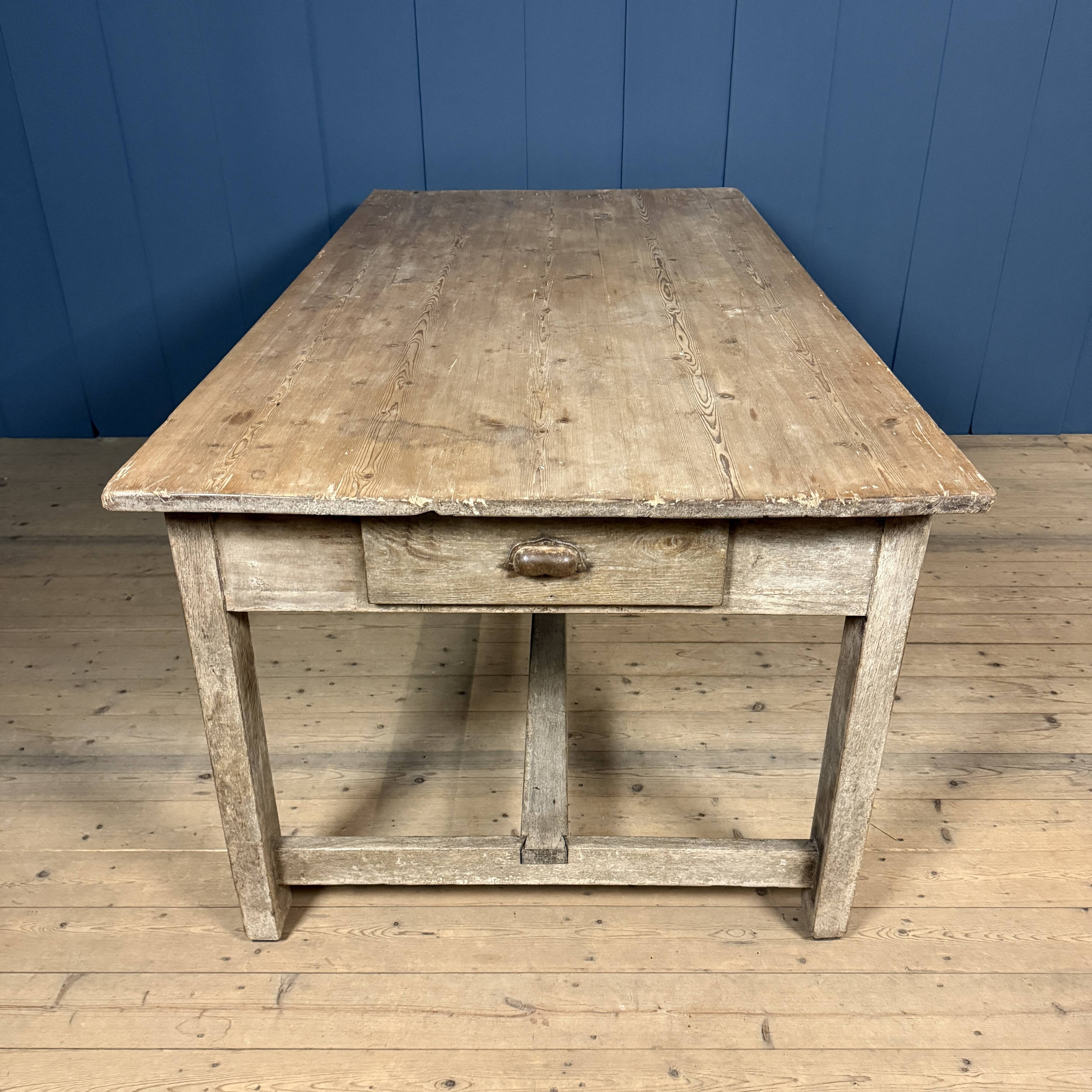 French farmhouse dining table with pine top and oak base