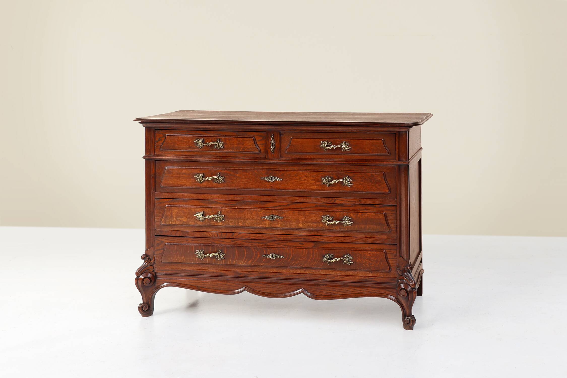 French Antique carved oak chest of drawers