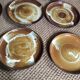 Série de 12 assiettes plates en grès