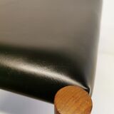 Danish designed footstool, in teak and black skai. Made at Spøttrup furniture factory in the 1960s.