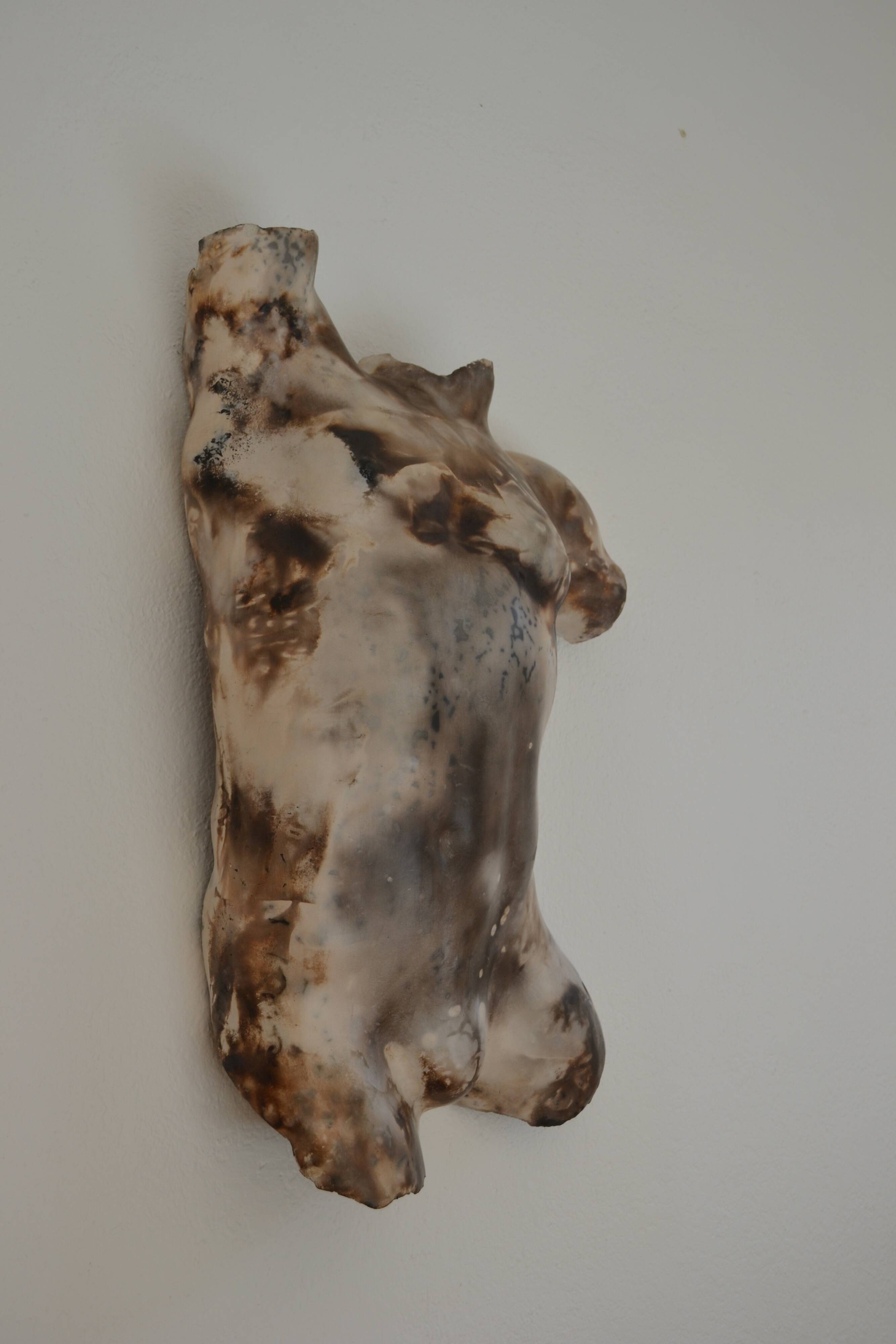 Male torso sculpture by patinated casting, signed to be identified.