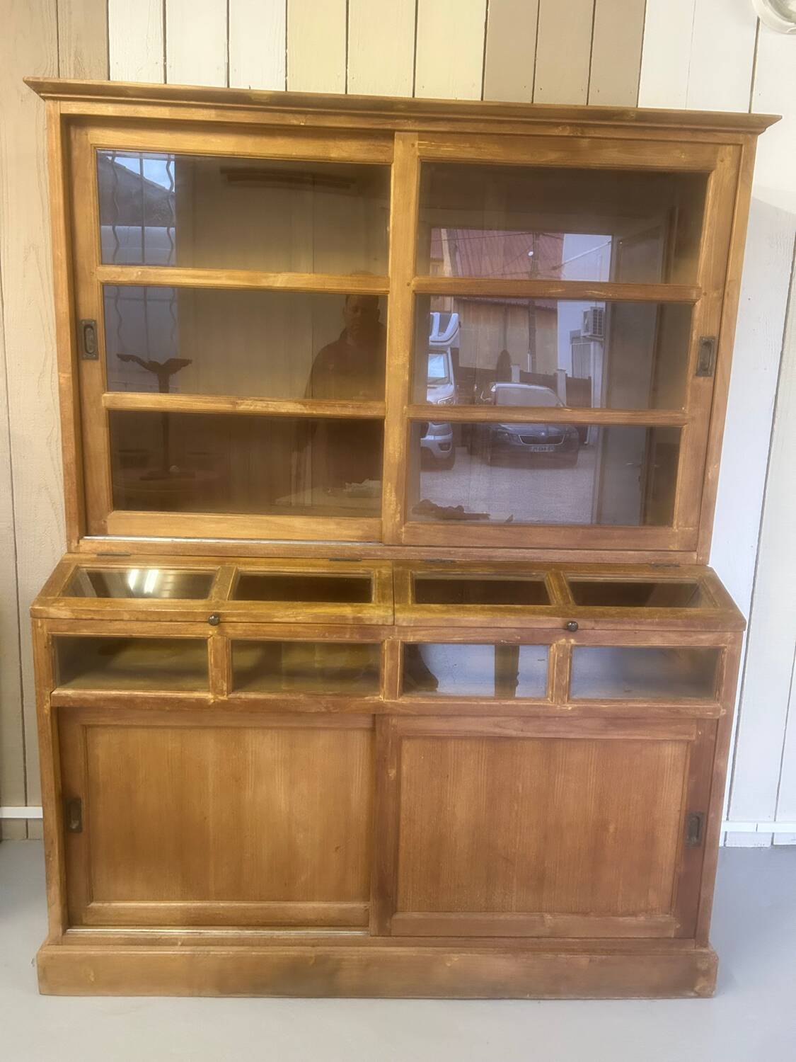 Large antique haberdashery cabinet with glass doors.