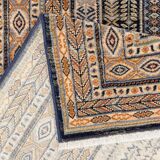 Black and beige Persian rug