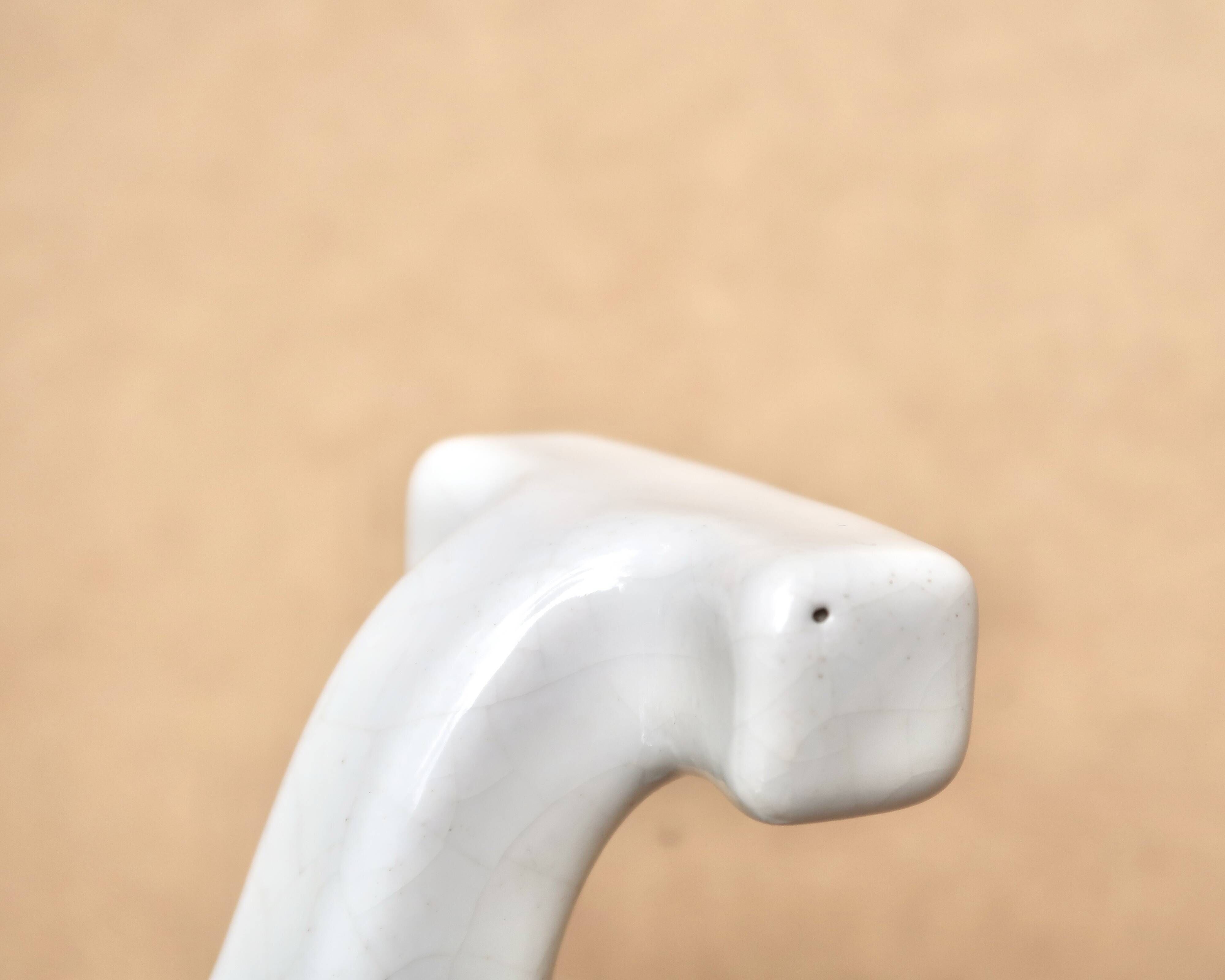 White porcelain coat hooks, 1950s