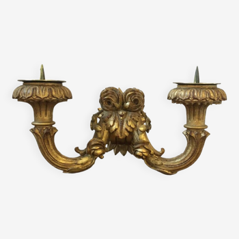 Golden wall candle holder