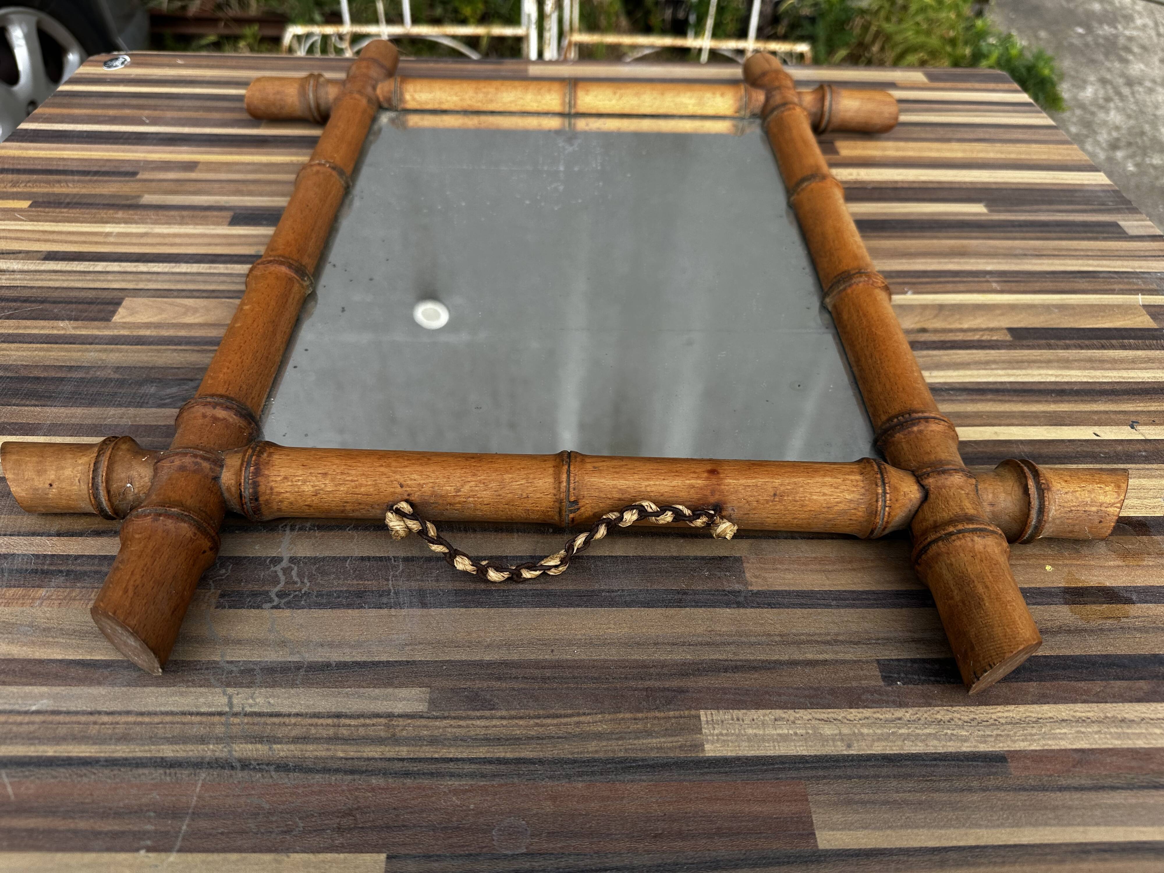 Antique mirror from the 1920s-1930s in bamboo H 49 cm / W 42 cm
