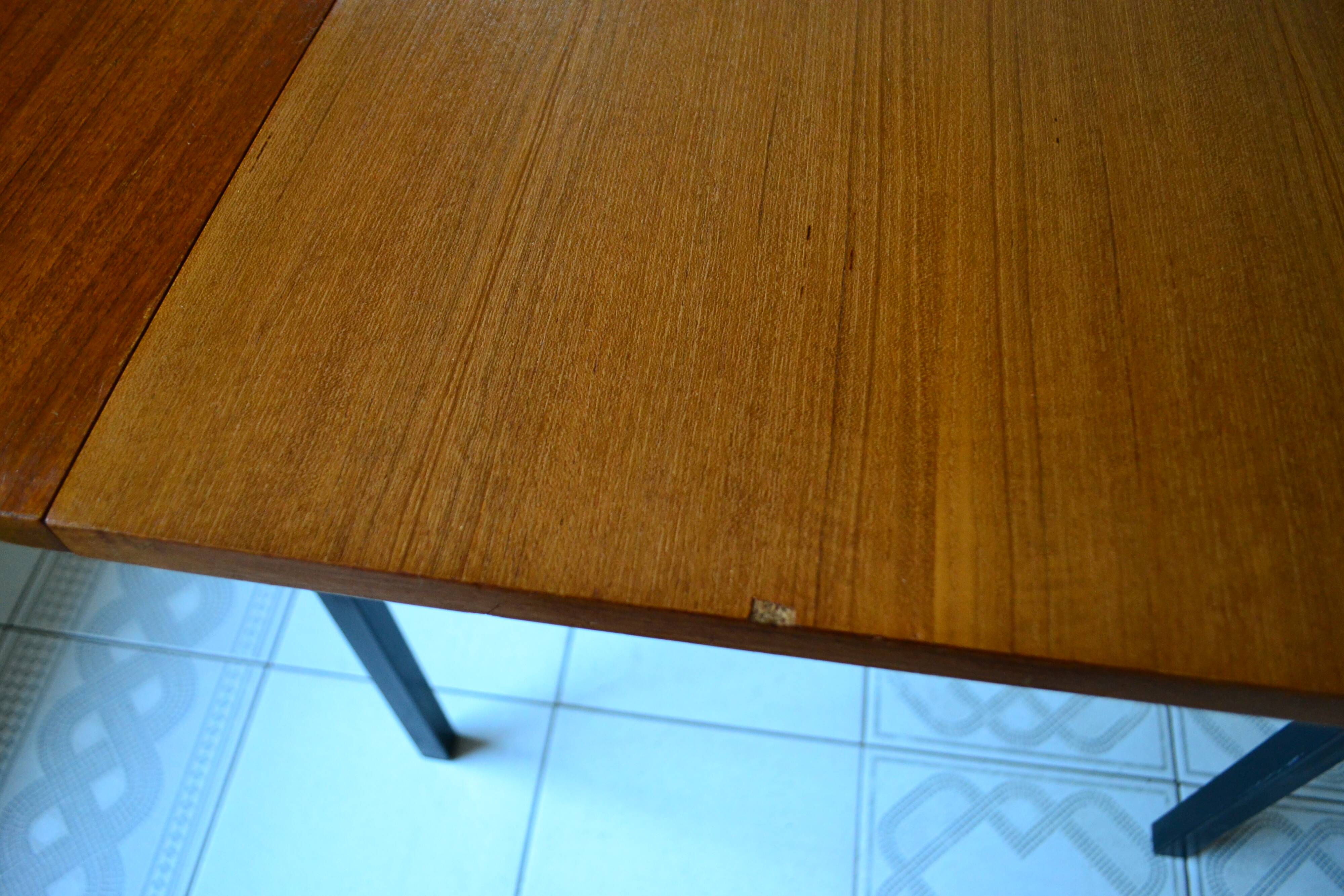 Dining table Pierre Guariche, teak and black steel from the 1960s with extension.