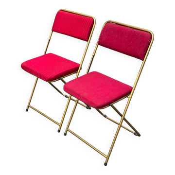 2 folding opera chairs Lafuma France 1970 in gold and burgundy.