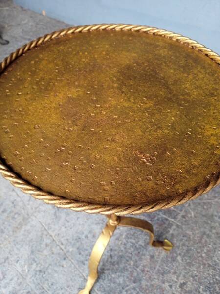 Minimalist brutalist gold metal pedestal table