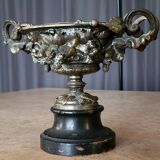 Patinated bronze cup, richly decorated with foliage and bunches of grapes