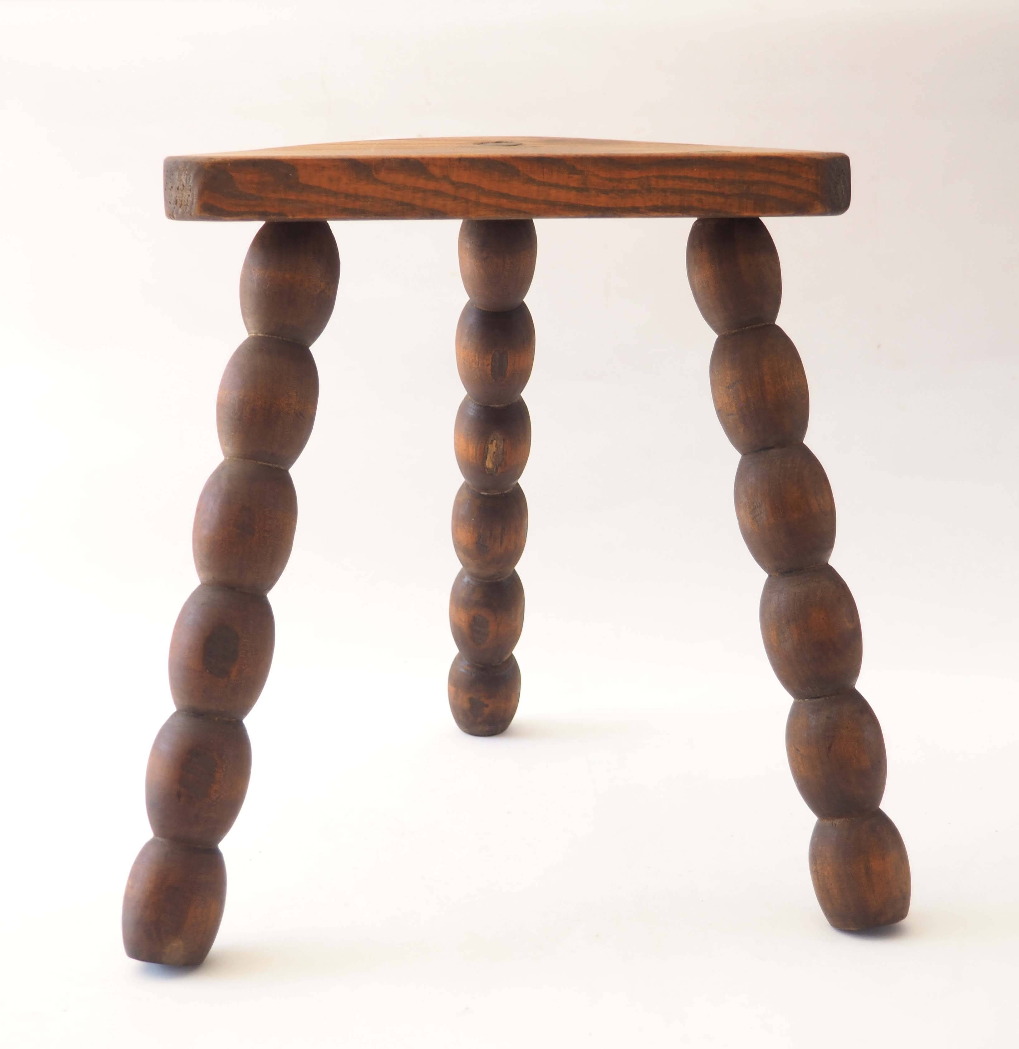 Beaded tripod stool