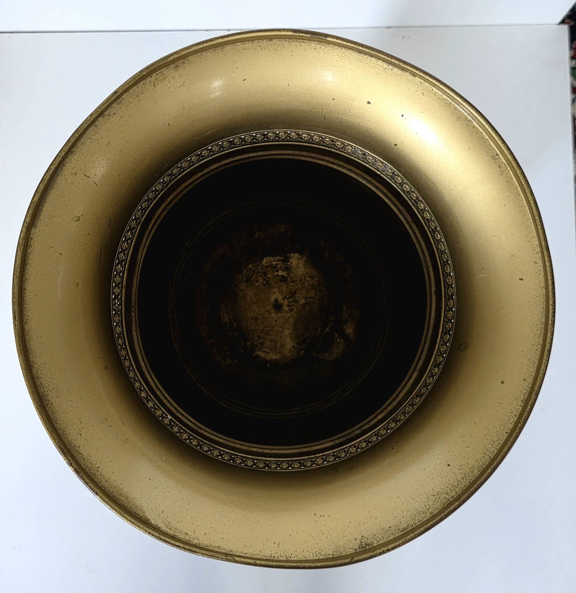Hollywood Regency style umbrella stand, brass finish and lio pattern.