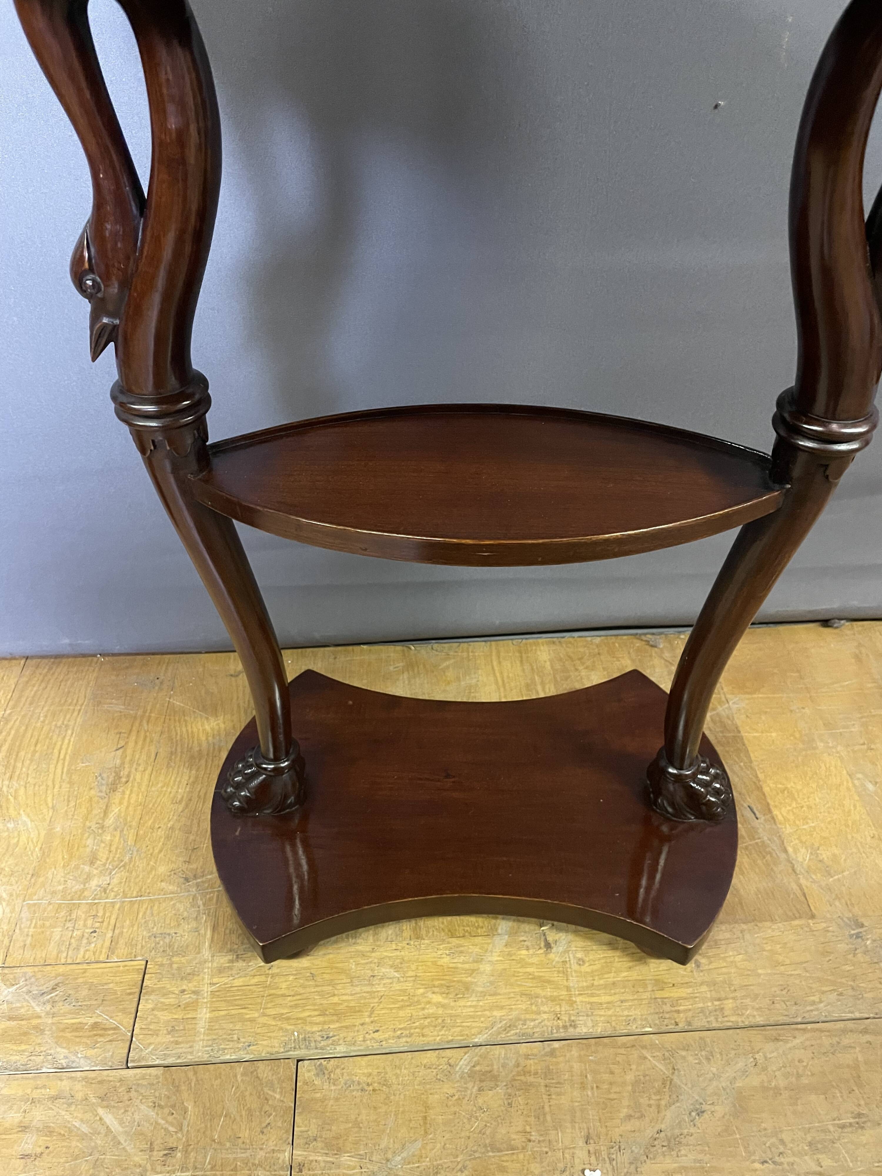 Mahogany bedside table with swan neck.