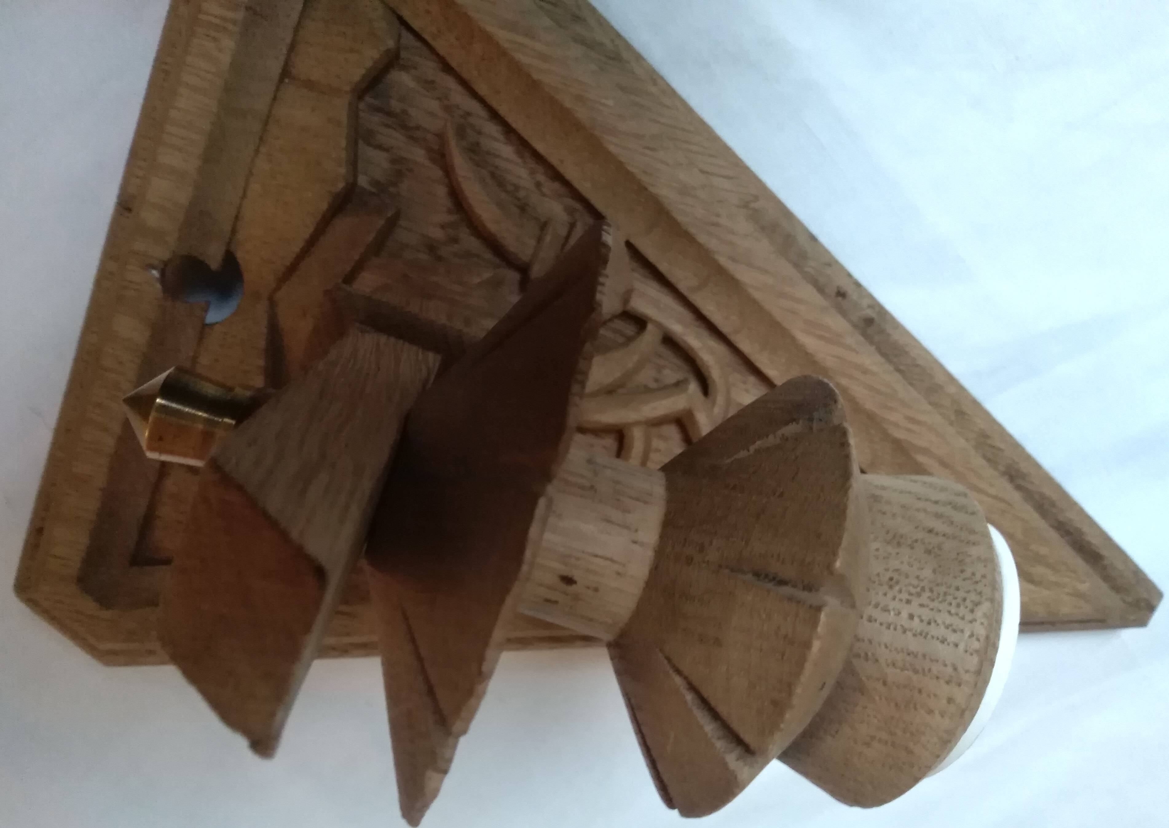 Old hand-carved wooden wall light