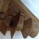 Old hand-carved wooden wall light
