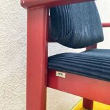 MMO Mobilier Collectif armchair, red patinated wood and black corduroy