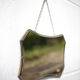 Vintage wall mirror with beveled chain
