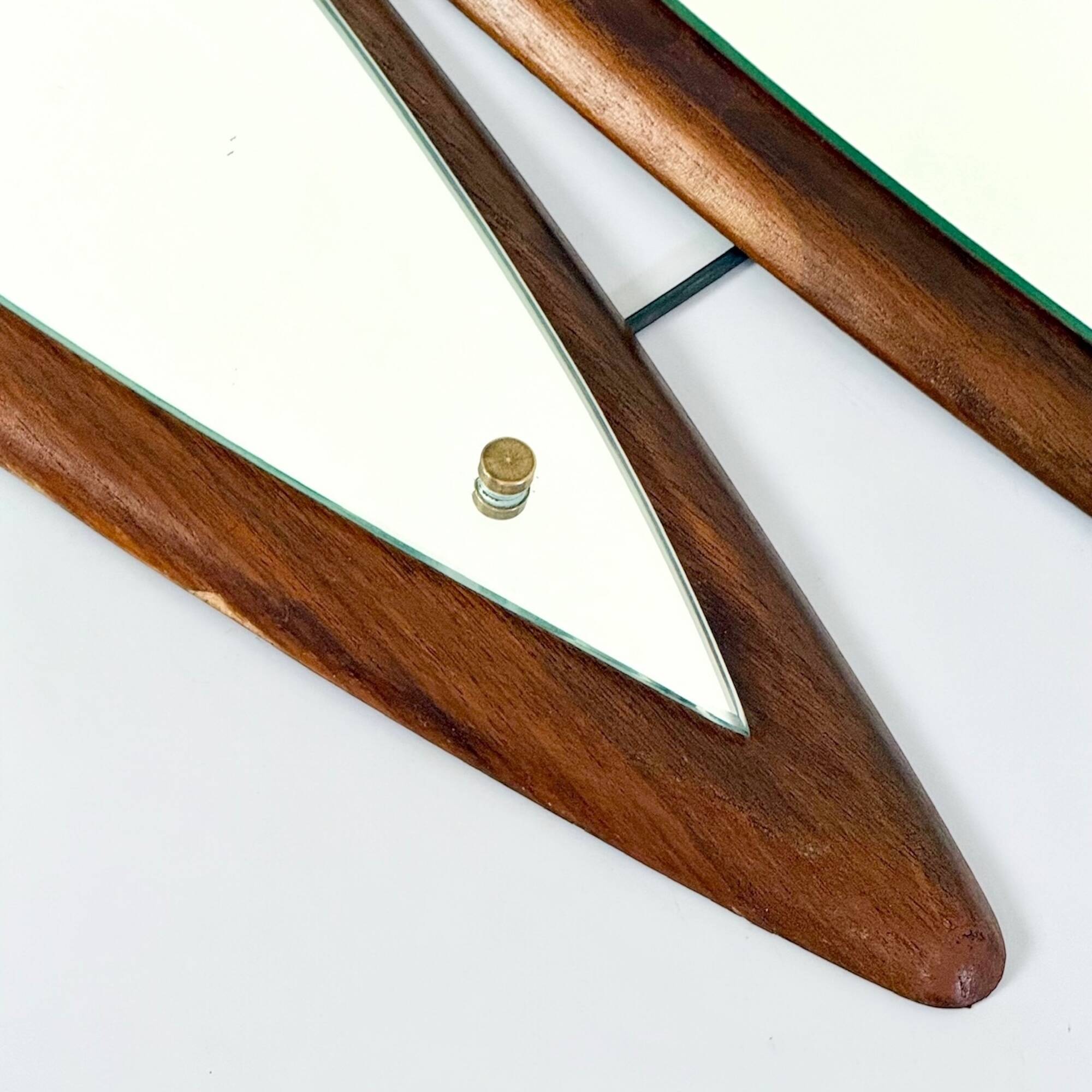 Italian sculptural wall mirror in wood from the 1960s.