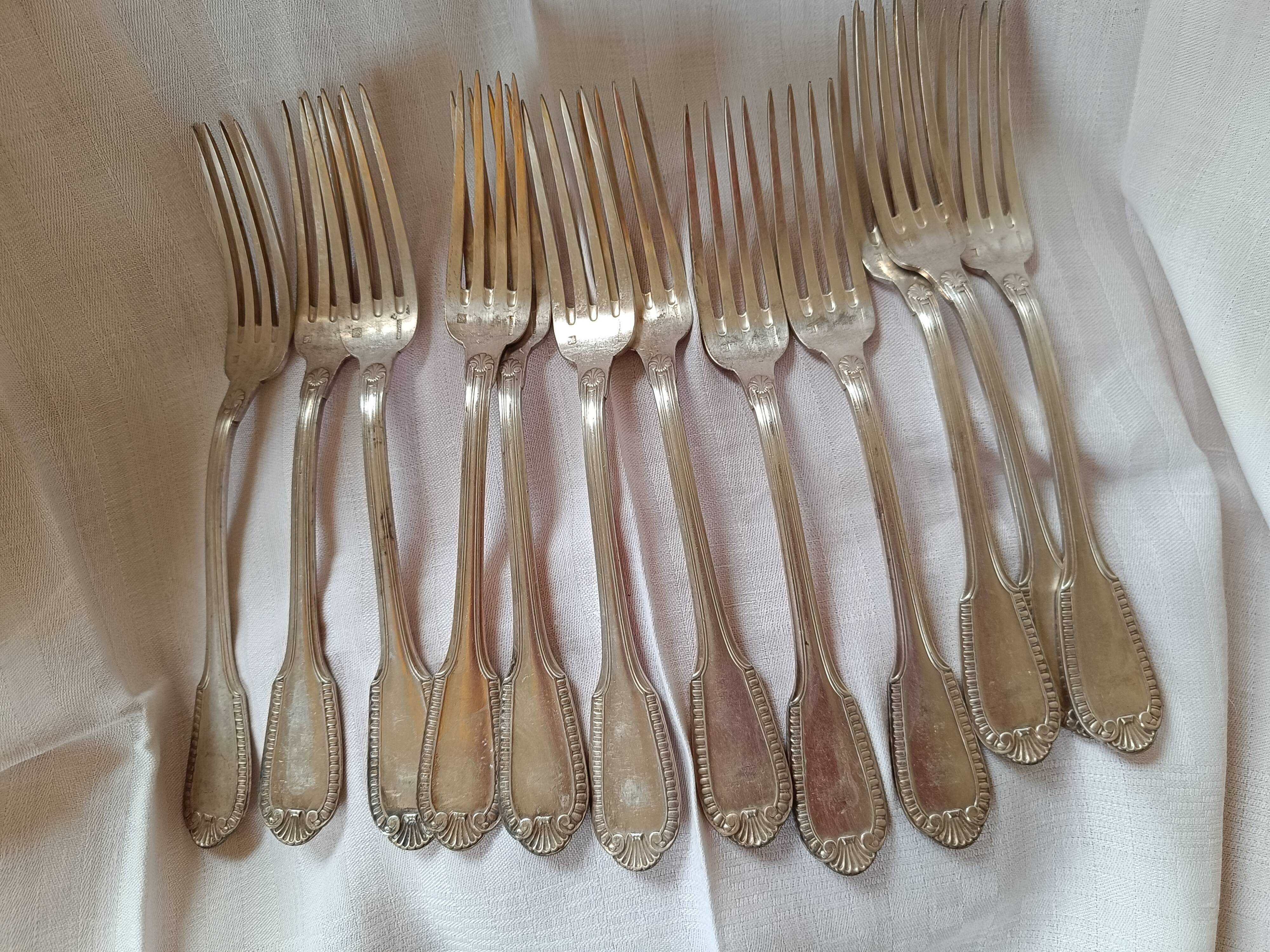 12 silver-plated forks. shell and pearls.