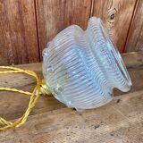 Vintage flower-shaped transparent glass pendant globe.