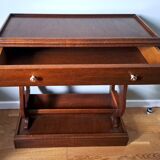 Pedestal table with lyre legs