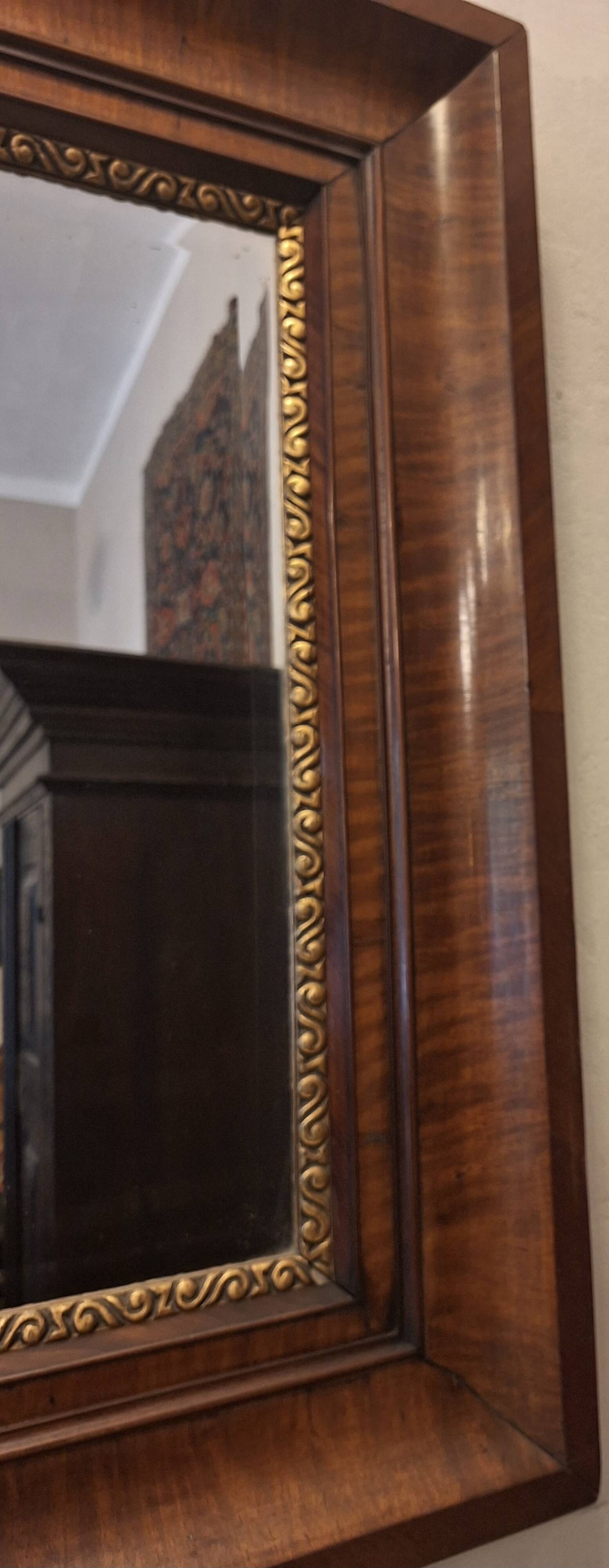 Antique beveled edge mirror in walnut frame, circa 1850