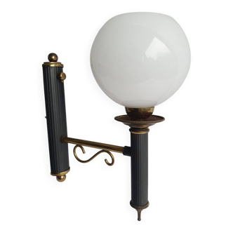 Empire style torch wall sconce