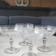 Lot of 4 x Champagne Coupes in Baccarat crystal. Engraved decoration with Greek friezes.