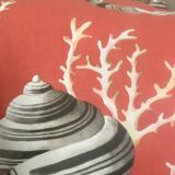 Coral and shell cushion