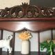 Carved wooden wall shelf for collection or other.