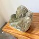 Stone sculpture of a man